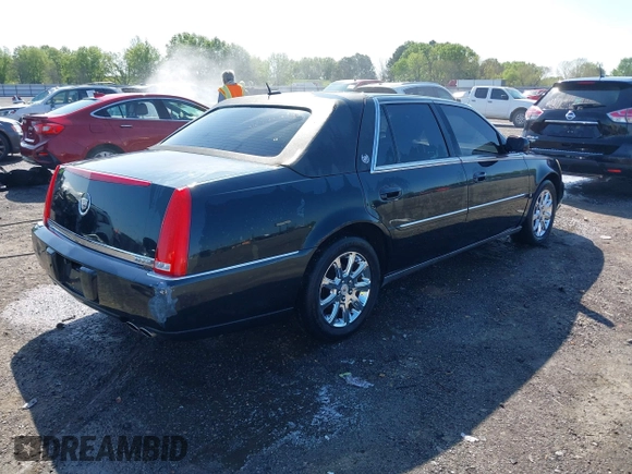 2008 Cadillac DTS 1SC with VIN 1G6KD57Y08U184384, listed as a IAAI auction lot 41974882 with 158,372 mi miles and . Bid and sale history available at carsss.com. Image 4.