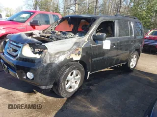 2009 Honda Pilot EX-L with VIN 5FNYF48699B023311, listed as a IAAI auction lot 41981928 with Not Provided miles and . Bid and sale history available at carsss.com. Image 2.