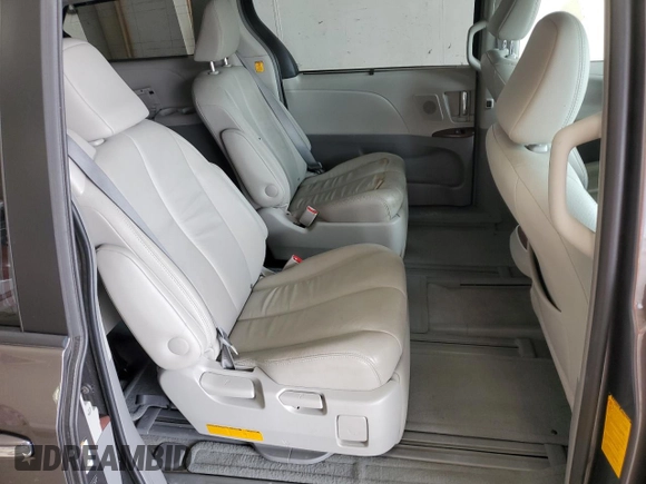 2012 Toyota Sienna XLE с VIN 5TDDK3DC8CS042919, выставлен на аукционе Copart как лот 62644385 с пробегом 135 252 миль миль и Списание • Salvage title. История ставок и продаж доступна на DreamBid. Изображение 11.
