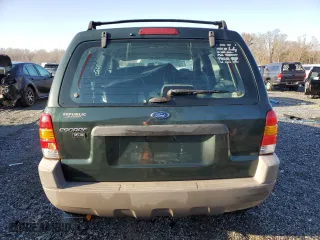 2001 Ford Escape XLS with VIN 1FMYU01161KA46822, listed as a Copart auction lot 48810055 with 253,402 mi miles and Salvage Title. Bid and sale history available at carsss.com. Image 6.
