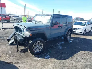 2015 Jeep Wrangler Unlimited Willys Wheeler with VIN 1C4BJWDG4FL589822, listed as a IAAI auction lot 41732614 with 149,112 mi miles and . Bid and sale history available at DreamBid. Image 20.