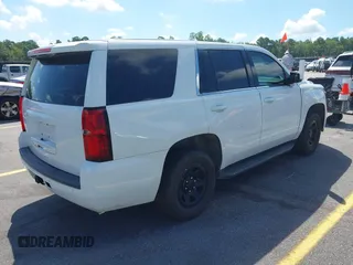 2018 Chevrolet Tahoe Commercial z VIN 1GNLCDEC1JR155210, wystawiony jako IAAI lot #42845068 z przebiegiem 159 456 mil mil oraz . Historia ofert i sprzedaży dostępna na DreamBid. Obrazek 4.