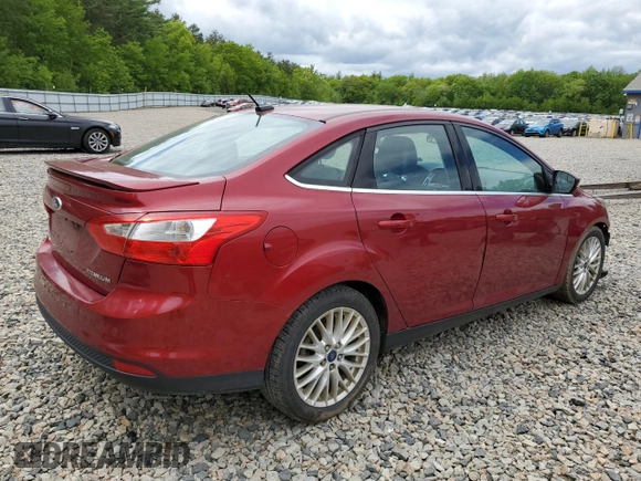 2014 Ford Focus Titanium with VIN 1FADP3J20EL352909, listed as a Copart auction lot 58501085 with 174,388 mi miles and Salvage title. Bid and sale history available at DreamBid. Image 3.