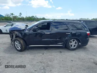 2013 Dodge Durango Crew with VIN 1C4RDHDG9DC684746, listed as a IAAI auction lot 42473302 with 122,602 mi miles and . Bid and sale history available at DreamBid. Image 15.
