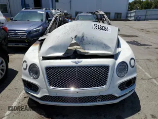2017 Bentley Bentayga W12 z VIN SJAAC2ZV6HC015975, wystawiony jako Copart lot #58138354 z przebiegiem Nie podano mil oraz Nie do naprawy • Non repairable. Historia ofert i sprzedaży dostępna na DreamBid. Obrazek 5.