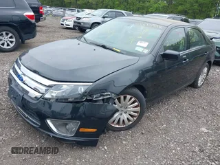 2012 Ford Fusion Hybrid with VIN 3FADP0L32CR251759, listed as a IAAI auction lot 42375826 with Not provided miles and . Bid and sale history available at DreamBid. Image 2.