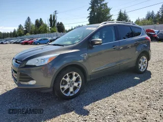 2016 Ford Escape Titanium with VIN 1FMCU9JX2GUA68784, listed as a Copart auction lot 58873625 with 157,859 mi miles and Clean title. Bid and sale history available at DreamBid. Image 1.