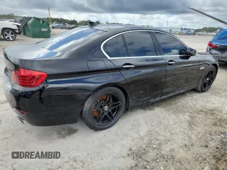2014 BMW 5 Series 550i with VIN WBAKN9C50ED680744, listed as a Copart auction lot 64983425 with 161,172 mi miles and Clean title. Bid and sale history available at DreamBid. Image 3.
