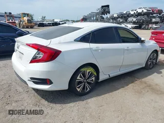 2018 Honda Civic EX-T z VIN 19XFC1F3XJE004123, wystawiony jako IAAI lot #42090933 z przebiegiem 81 228 mil mil oraz . Historia ofert i sprzedaży dostępna na DreamBid. Obrazek 4.