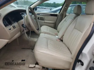 2006 Lincoln Town Car Signature z VIN 1LNHM81WX6Y645415, wystawiony jako Copart lot #57939425 z przebiegiem 91 829 mil mil oraz Szkoda całkowita • Salvage title. Historia ofert i sprzedaży dostępna na DreamBid. Obrazek 7.