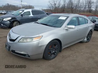 2009 Acura TL Tech with VIN 19UUA86519A013039, listed as a IAAI auction lot 41656570 with 241,217 mi miles. Bid and sale history available at carsss.com. Image 2.