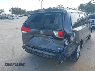 2014 Toyota Sienna LE AAS with VIN 5TDKK3DCXES432611, listed as a IAAI auction lot 40771635 with 214,145 mi miles and . Bid and sale history available at carsss.com. Image 6.
