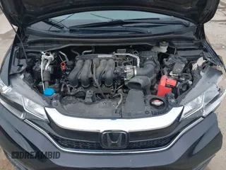 2019 Honda Fit EX with VIN 3HGGK5H82KM713712, listed as a IAAI auction lot 41972552 with 47,831 mi miles and . Bid and sale history available at DreamBid. Image 10.