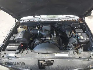 1999 Cadillac Escalade z VIN 1GYEK13R6XR404534, wystawiony jako IAAI lot #41391379 z przebiegiem 127 612 mil mil oraz . Historia ofert i sprzedaży dostępna na DreamBid. Obrazek 10.
