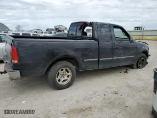 1997 Ford F-150 Standard with VIN 2FTDX1761VCA95231, listed as a Copart auction lot 50434775 with 118,871 mi miles and Salvage Title. Bid and sale history available at carsss.com. Image 3.