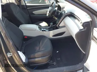 2022 Hyundai Tucson SEL with VIN 5NMJB3AEXNH144592, listed as a IAAI auction lot 42037487 with 75,651 mi miles and . Bid and sale history available at DreamBid. Image 5.