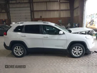 2014 Jeep Cherokee Altitude with VIN 1C4PJMCB7EW186432, listed as a IAAI auction lot 42076018 with 150,186 mi miles and . Bid and sale history available at DreamBid. Image 13.