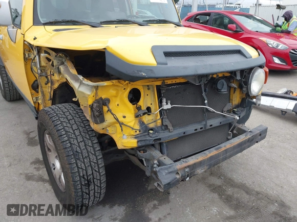 2007 Toyota FJ Cruiser with VIN JTEBU11FX70037231, listed as a IAAI auction lot 42018669 with 129,670 mi miles. Bid and sale history available at carsss.com. Image 6.