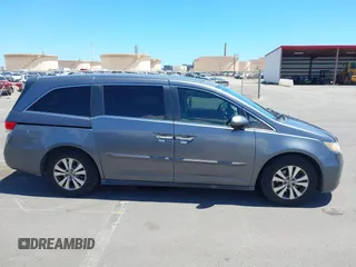 2014 Honda Odyssey EX-L with VIN 5FNRL5H69EB018557, listed as a IAAI auction lot 42855051 with 165,081 mi miles and . Bid and sale history available at DreamBid. Image 13.