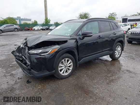 2022 Toyota Corolla Cross LE with VIN 7MUCAABG8NV004527, listed as a IAAI auction lot 42259519 with 15,211 mi miles and . Bid and sale history available at DreamBid. Image 16.