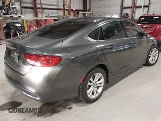 2015 Chrysler 200 Limited with VIN 1C3CCCAB1FN688550, listed as a IAAI auction lot 42063311 with 74,407 mi miles and . Bid and sale history available at DreamBid. Image 4.