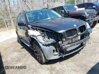 2012 BMW X5 35i z VIN 5UXZV4C56CL765738, wystawiony jako IAAI lot #41918121 z przebiegiem 98 311 mil mil oraz . Historia ofert i sprzedaży dostępna na DreamBid. Obrazek 1.