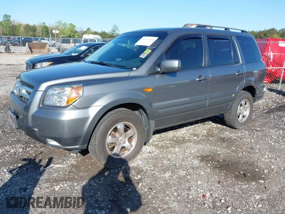 2007 Honda Pilot EX-L with VIN 2HKYF18727H528564, listed as a IAAI auction lot 42010708 with 260,364 mi miles and . Bid and sale history available at DreamBid. Image 2.