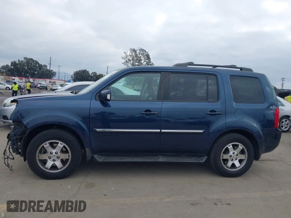 2009 Honda Pilot Touring with VIN 5FNYF48929B040199, listed as a IAAI auction lot 41466006 with 167,959 mi miles and . Bid and sale history available at carsss.com. Image 15.