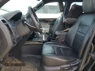 2011 Ford Escape Limited with VIN 1FMCU9EGXBKA75058, listed as a Copart auction lot 51312665 with 121,220 mi miles and Salvage Title. Bid and sale history available at DreamBid. Image 7.