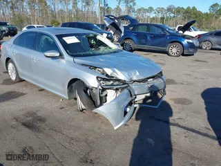 2018 Volkswagen Passat 2.0T SE with VIN 1VWBA7A37JC050303, listed as a IAAI auction lot 41699336 with 61,661 mi miles. Bid and sale history available at carsss.com. Image 1.