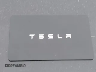 2020 Tesla Model 3 Standard Range Plus with VIN 5YJ3E1EA1LF799766, listed as a IAAI auction lot 41386508 with 90,000 mi miles. Bid and sale history available at carsss.com. Image 11.