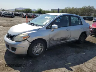 2010 Nissan Versa S with VIN 3N1BC1AP0AL362239, listed as a Copart auction lot 60091435 with 86,556 mi miles and Salvage title. Bid and sale history available at DreamBid. Image 1.
