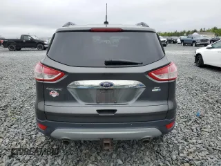 2016 Ford Escape SE z VIN 1FMCU9G96GUB76771, wystawiony jako Copart lot #59188375 z przebiegiem 167 300 mil mil oraz Szkoda całkowita • Salvage title. Historia ofert i sprzedaży dostępna na DreamBid. Obrazek 6.