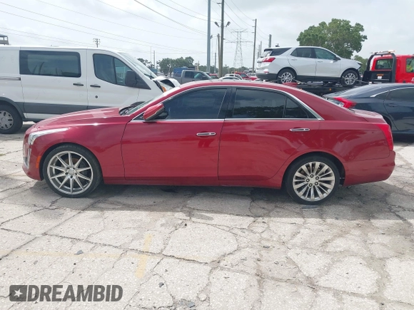 2015 Cadillac CTS Luxury AWD with VIN 1G6AX5SX2F0112852, listed as a IAAI auction lot 42398611 with 70,253 mi miles and . Bid and sale history available at DreamBid. Image 14.