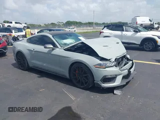 2021 Ford Mustang GT z VIN 1FA6P8CF7M5128125, wystawiony jako IAAI lot #42462614 z przebiegiem 31 518 mil mil oraz . Historia ofert i sprzedaży dostępna na DreamBid. Obrazek 1.