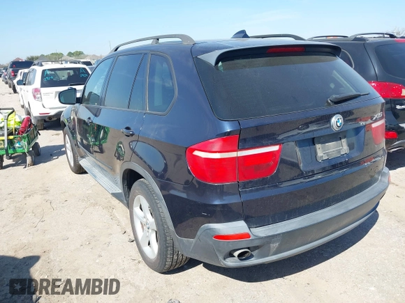 2008 BMW X5 3.0si with VIN 5UXFE43588L025702, listed as a IAAI auction lot 41705837 with 184,296 mi miles. Bid and sale history available at carsss.com. Image 3.