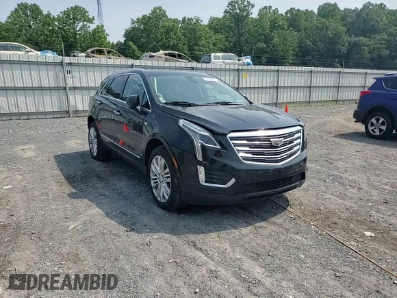 2019 Cadillac XT5 Premium Luxury AWD with VIN 1GYKNFRS9KZ223065, listed as a Copart auction lot 60902645 with 101,168 mi miles and Salvage title. Bid and sale history available at DreamBid. Image 14.