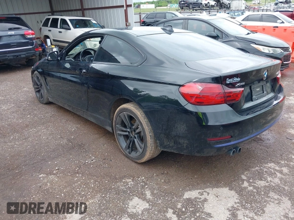 2015 BMW 4 Series 428i xDrive with VIN WBA3N5C56FK198340, listed as a IAAI auction lot 42153190 with 96,054 mi miles and . Bid and sale history available at DreamBid. Image 3.