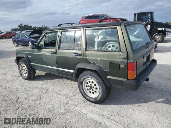 1996 Jeep Cherokee SE z VIN 1J4FJ28S9TL211073, wystawiony jako Copart lot #78052574 z przebiegiem 174 967 mil mil oraz Nie do naprawy • Non repairable. Historia ofert i sprzedaży dostępna na DreamBid. Obrazek 2.
