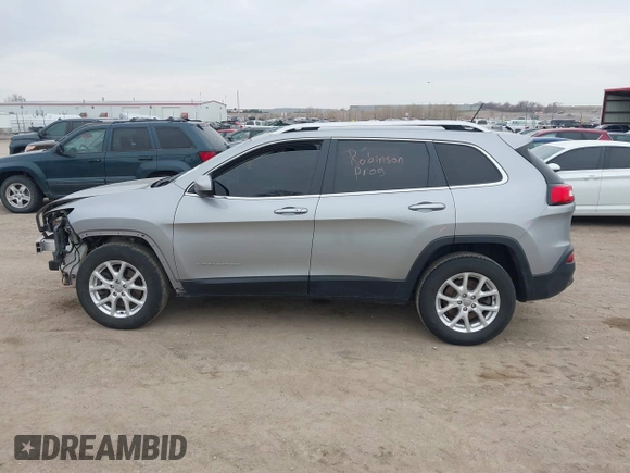 2014 Jeep Cherokee Latitude with VIN 1C4PJMCS7EW220899, listed as a IAAI auction lot 41973561 with 135,572 mi miles. Bid and sale history available at carsss.com. Image 15.