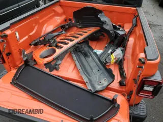 2020 Jeep Gladiator Rubicon z VIN 1C6JJTBG8LL156097, wystawiony jako Copart lot #53087525 z przebiegiem 70 252 mil mil oraz Szkoda całkowita • Salvage title. Historia ofert i sprzedaży dostępna na DreamBid. Obrazek 13.
