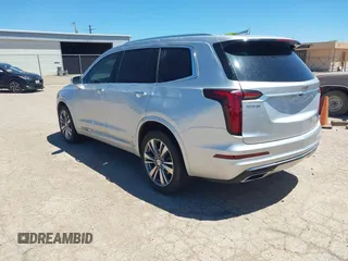 2020 Cadillac XT6 FWD Premium Luxury with VIN 1GYKPCRS7LZ104392, listed as a IAAI auction lot 42278675 with 81,001 mi miles and . Bid and sale history available at DreamBid. Image 3.