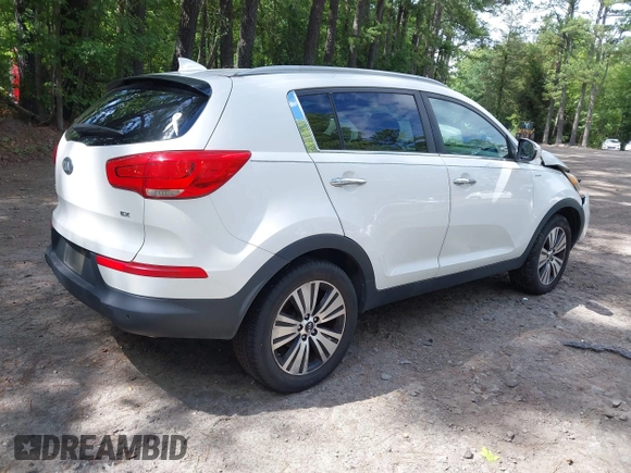 2014 Kia Sportage EX with VIN KNDPCCAC5E7658993, listed as a IAAI auction lot 42679549 with 107,658 mi miles and . Bid and sale history available at DreamBid. Image 4.