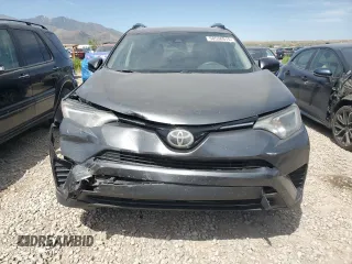 2017 Toyota RAV4 LE with VIN 2T3BFREV4HW592199, listed as a Copart auction lot 58538915 with 137,964 mi miles and Salvage title. Bid and sale history available at DreamBid. Image 5.