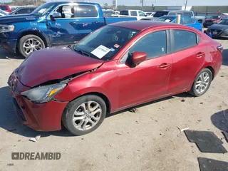 2016 Scion iA with VIN 3MYDLBZVXGY108176, listed as a IAAI auction lot 41590603 with 227,001 mi miles. Bid and sale history available at carsss.com. Image 2.