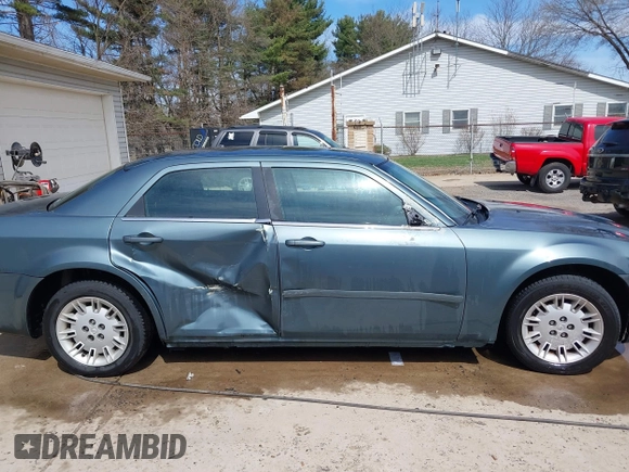 2005 Chrysler 300 with VIN 2C3JA43R45H616682, listed as a IAAI auction lot 41853835 with 158,464 mi miles. Bid and sale history available at carsss.com. Image 13.