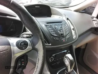 2014 Ford C-Max SE z VIN 1FADP5AU8EL520521, wystawiony jako IAAI lot #42348089 z przebiegiem 89 105 mil mil oraz . Historia ofert i sprzedaży dostępna na DreamBid. Obrazek 1.