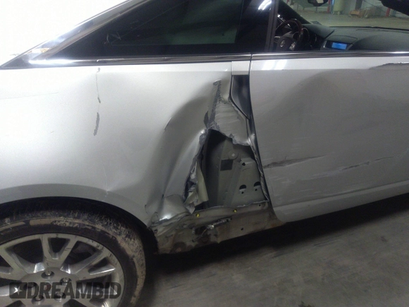 2012 Cadillac CTS Performance with VIN 1G6DJ1E31C0110232, listed as a IAAI auction lot 41185119 with 140,298 mi miles and . Bid and sale history available at DreamBid. Image 6.