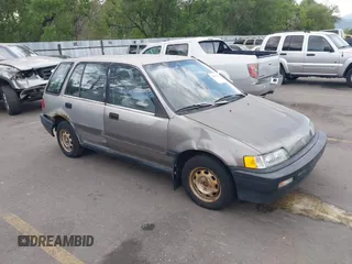 1990 Honda Civic z VIN JHMEE2857LS005562, wystawiony jako IAAI lot #42476332 z przebiegiem 241 183 mil mil oraz . Historia ofert i sprzedaży dostępna na DreamBid. Obrazek 1.