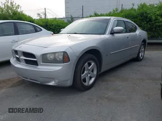 2010 Dodge Charger SXT with VIN 2B3CA3CV0AH287289, listed as a IAAI auction lot 42036118 with 283,080 mi miles. Bid and sale history available at carsss.com. Image 2.